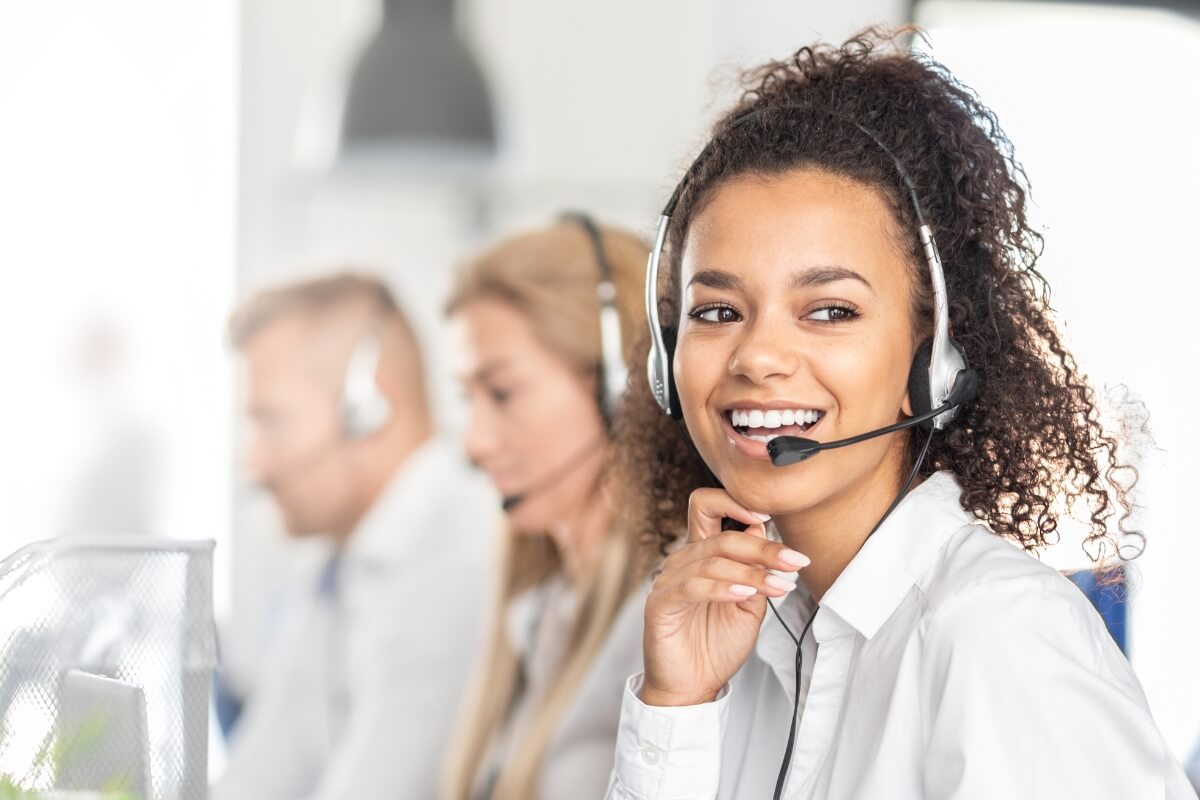 Call center worker accompanied by her team.