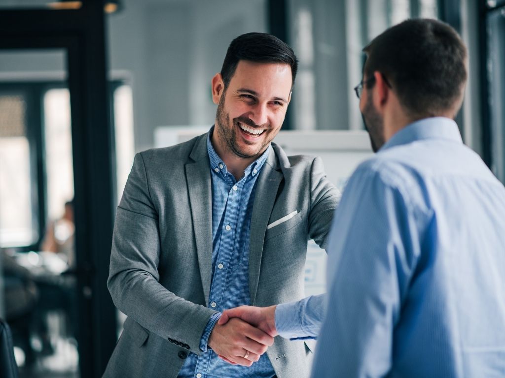 Two businessmen shaking hands